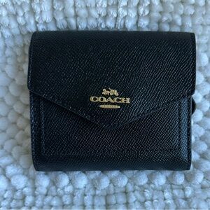 Coach Women’s Trifold peppled leather Wallet